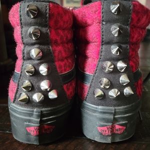 Vans red leopard print high tops.